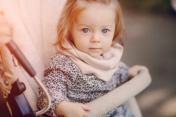 young family walking in the park