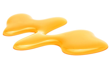 Sweet honey drips isolated on white background. Syrup droplet, nectar drops.