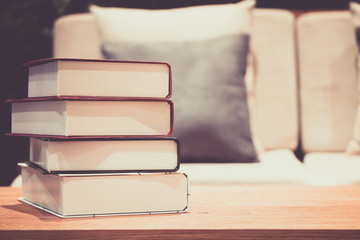 Book stack on the table in the living room.
