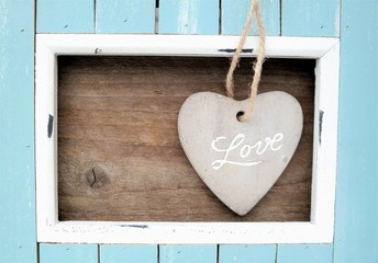 valentines background or card, heart with wooden background and blue vintage frame