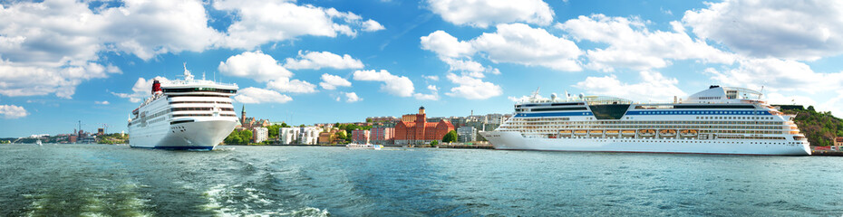 Fototapeta na wymiar View to Stockholm from seaside in Sweden. Two ferries are at bay near stockholm on beautiful sunny day in summer.