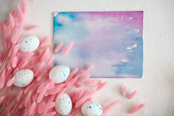 Easter mock up with fluffy flowers, eggs and watercolor abstract painting with space for text