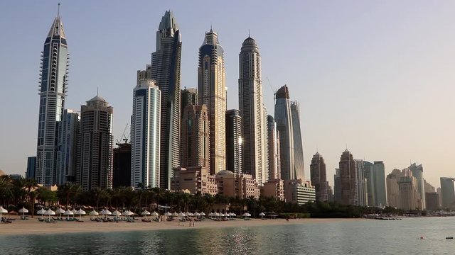 Long timelapse video of the beautiful Dubai Marina beach, from day to night