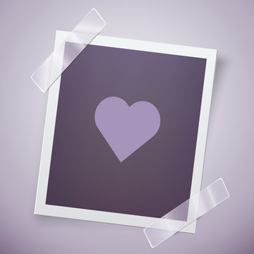 Retro photo frame with heart. Romantic concept. Happy Valentine day motive.