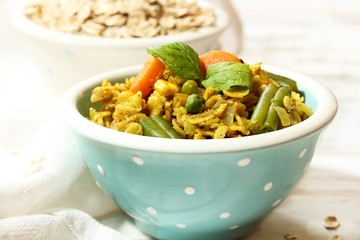 Masala Oats Upma - Healthy breakfast, selective focus