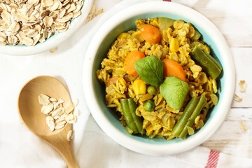 Masala Oats Upma - Healthy breakfast, selective focus