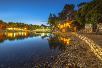 Fototapeta premium Rocky bay on a summer night