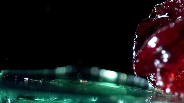 Slow motion of jello being shot by airgun.