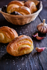 Baked savory bread rolls stuffed with garlic