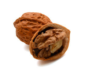 Cracked walnuts isolated on white background