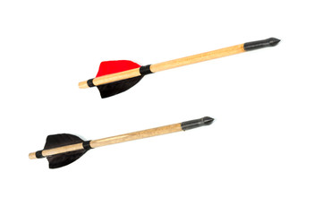 Two arrow handmade handcraft with black and red feathers isolated in white background