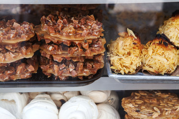 detail of pastries in bakery window