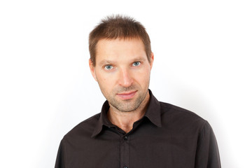 Obraz premium The young man is perplexed and surprised