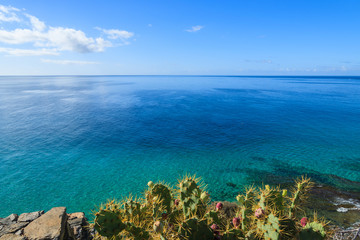 Fototapeta na wymiar Beautiful colours of ocean lagoon on coast of Morro Jable village on Jandia peninsula, Fuerteventura, Canary Islands, Spain