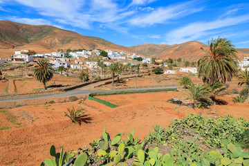 View of volcanic mountains and Pajara village in countryside landscape of Fuerteventura, Canary Islands, Spain