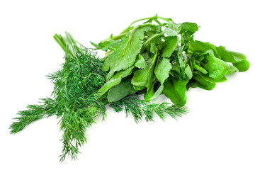 green dill and spinach on a white background