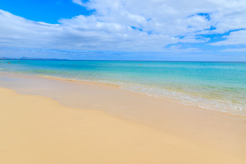 Fototapeta na wymiar Beautiful Morro Jable beach on Jandia peninsula, Fuerteventura, Canary Islands, Spain