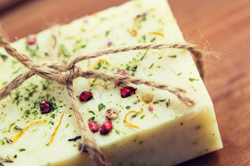 close up of handmade soap bars on wood