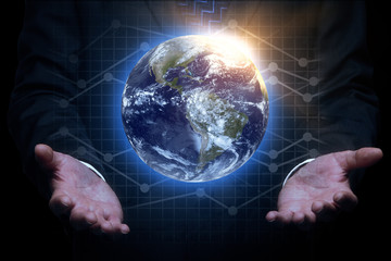 Hands holding globe