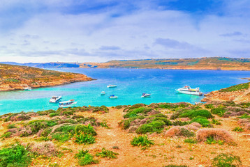 Fototapeta na wymiar Beautiful view over the famous Blue Lagoon in Comino island in summer, attraction ireland of Malta