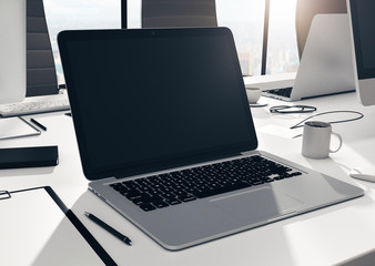 Blank laptop on office table
