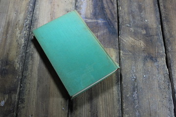 Still life composing old book on wood
