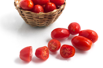 Cherry Tomatoes into a basket