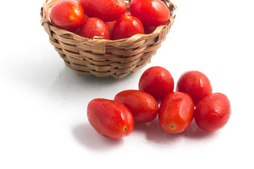 Cherry Tomatoes into a basket