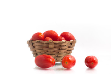 Cherry Tomatoes into a basket