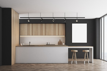 Black kitchen with bar and poster