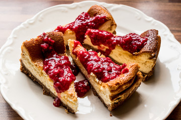 Homemade Raspberry Cheesecake in white plate