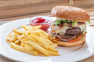 tasty burger with french fries