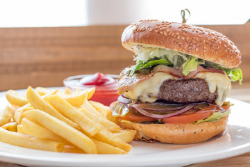 tasty burger with french fries