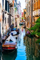 Obraz na płótnie Canvas Reflections on Venetian Canal
