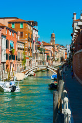 Fototapeta na wymiar Venetian Canal with bridge