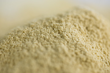 Pile of dry ginger powder isolated