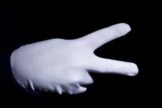Hand in a white glove