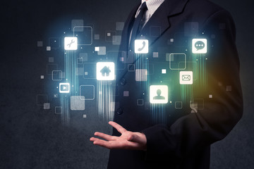 Businessman holding blue applications