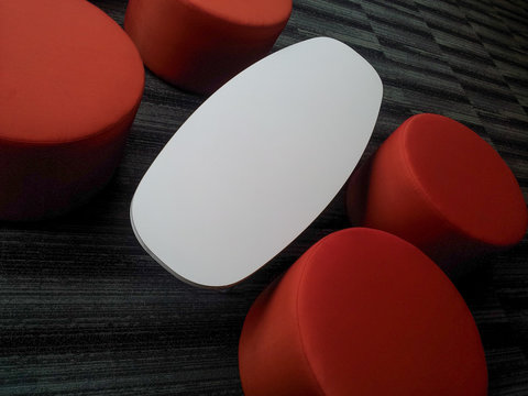 White table and red chairs