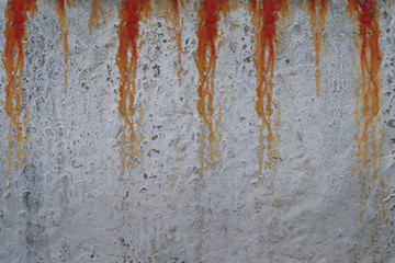 Bloody concrete wall with red blood drops background texture. Walking dead apocalypse.