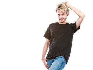 Fototapeta premium Happy young man posing wearing trendy outfit