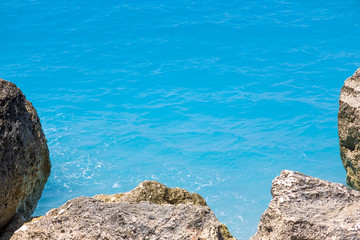 Fototapeta na wymiar View of the sea and rocks on the beautiful beach