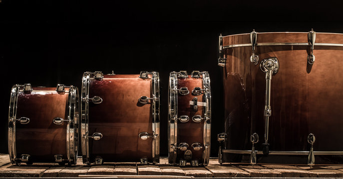 Drums, Musical Percussion Instruments On A Black Background