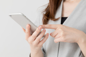 携帯電話を使う女性、ビジネス、
