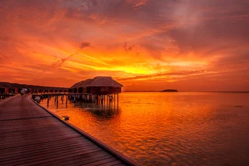 Poster de jardin Mer / coucher de soleil Sunset at Maldivian beach