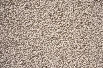 Rough sand colored wall