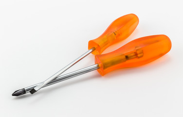 Phillips screwdriver and small screwdriver on white background