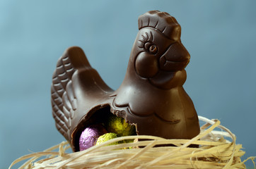 Easter chocolate eggs and hen
