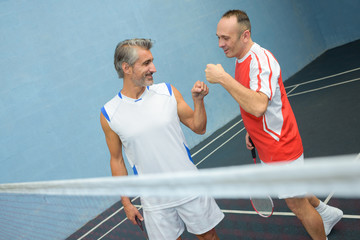 men playing badminton