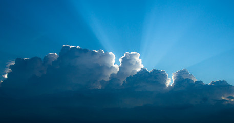 Rays of light shining through clouds, suitable for background